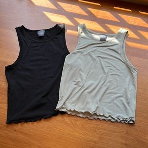 Two cropped tank tops